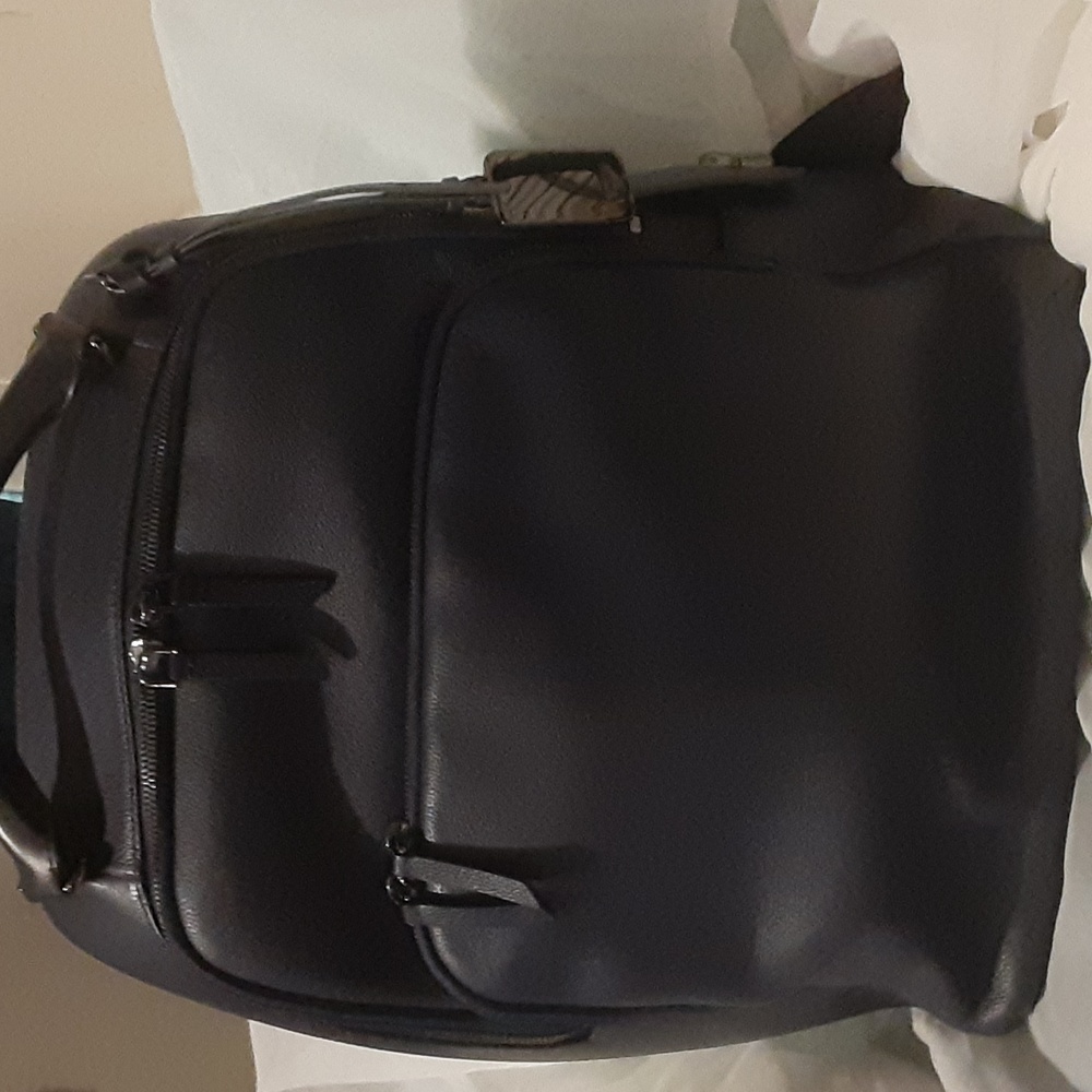Tumi Stanton Gail navy blue luxury travel leather backpack
